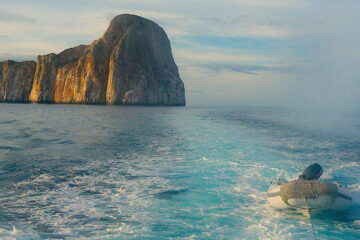 Kicker Rock snorkeling tour in San Cristóbal, Galápagos Islands – spot sea turtles, reef sharks, and tropical fish in crystal-clear waters.