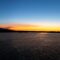 Golden sunset over Fernandina Island, the youngest and most volcanically active island in the Galápagos. Lava flows meet the Pacific Ocean, creating a dramatic landscape untouched by human presence — a sanctuary for marine iguanas, flightless cormorants, and Galápagos hawks.